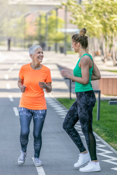 istock Young and senior sportswoman running 1002749596