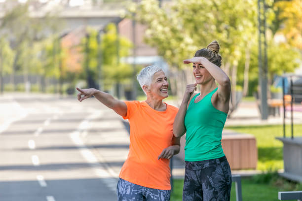 istock Young and senior sportswoman running 1002749952
