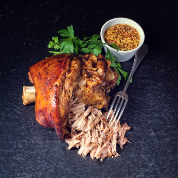 istock fresh roasted knuckle of pork with mustard 1002752960