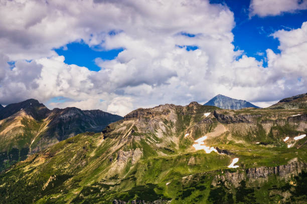 istock European Alps With Cumulus Clouds 1002753172