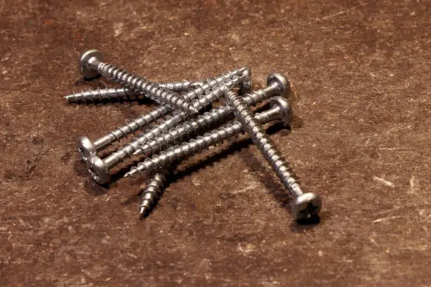 A few steel screw for using on the working desk