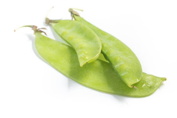 istock Pile of Green Peas Pods 1002756870
