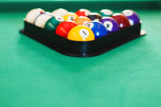 istock balls on a billiard table in a triangle. game of American billiards 1002768420