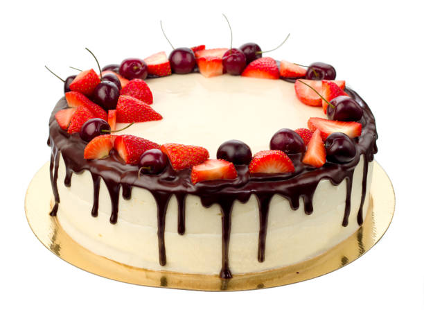 istock delicious cake with cherries strawberries and chocolate cream 1002773484