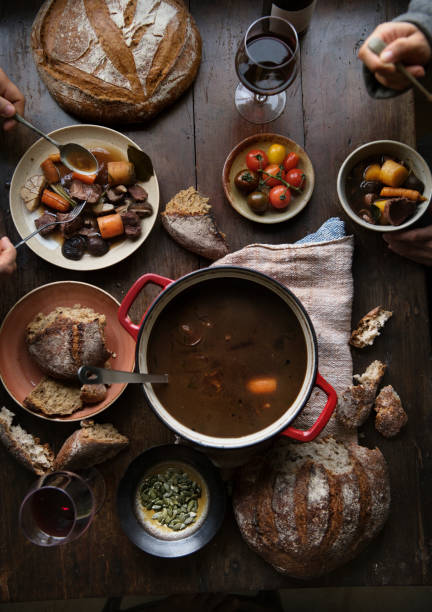 istock Dinner table with a meat stew food photography recipe idea 1002774640