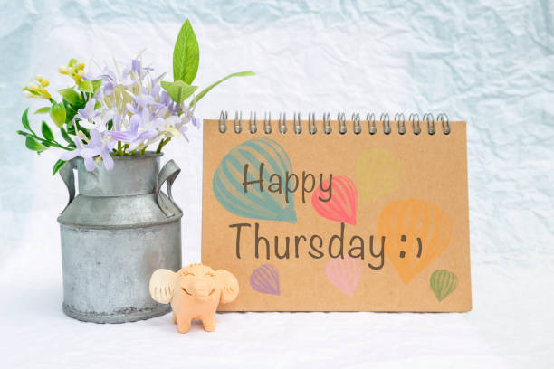 istock Happy Thursday on design notebook cover with smiling elephant clay 1002775338