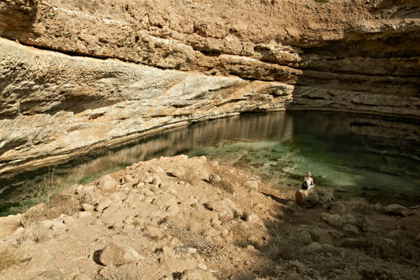 istock Bimmah Sink hole (Dibba Al Bay Ah). Sultanate of Oman. Arabian Peninsula 1002777522