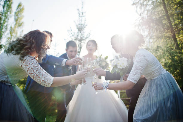 istock Wedding couple and groomsmen with bridesmaids 1002778452