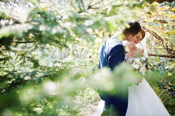 istock Young happy wedding couple 1002779070