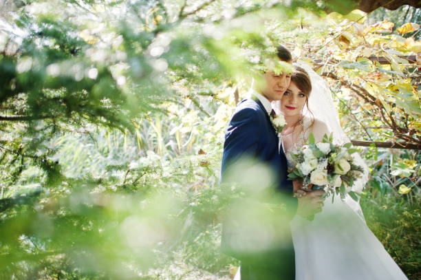istock Young happy wedding couple 1002779126
