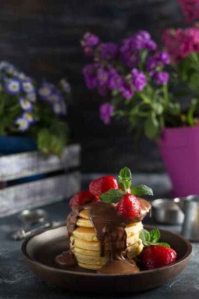 istock Fluffy Pancakes with Strawberries & Chocolate 1002779212