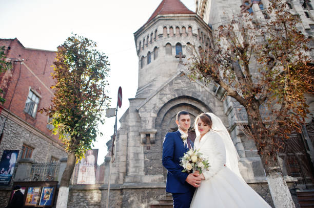 istock Young beautiful wedding couple 1002780194
