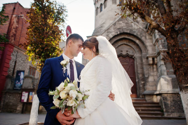istock Young beautiful wedding couple 1002782304