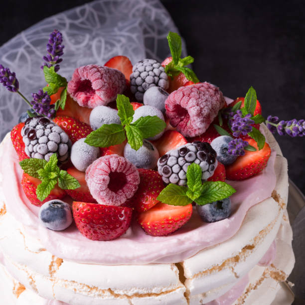 istock Pavlova with berry fruits 1002786864