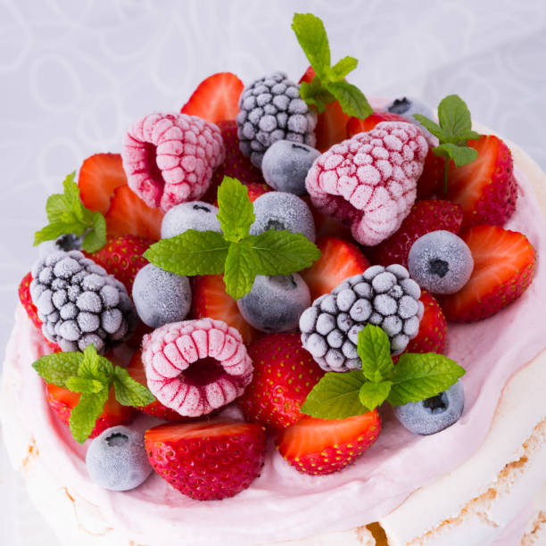 istock Pavlova with berry fruits 1002787548