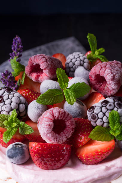 istock Pavlova with berry fruits 1002788056
