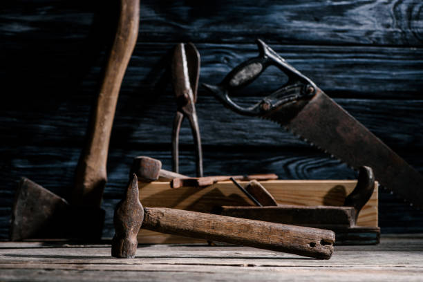 istock selective focus of vintage carpentry tools arranged on wooden tabletop 1002801790