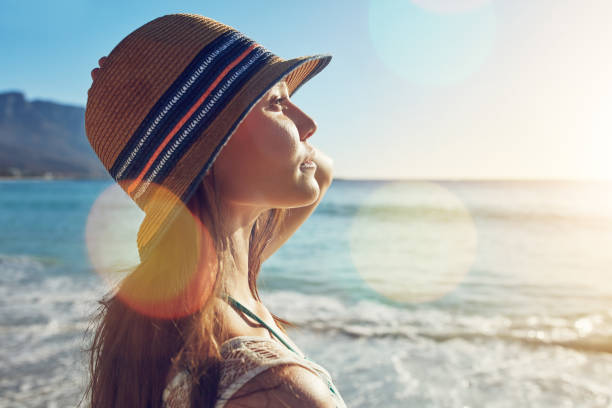 istock The sun shines upon her with its warmth 1002802440
