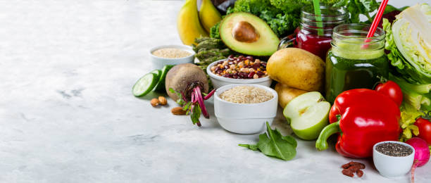 istock Alkaline diet concept - fresh foods on rustic background 1002840654