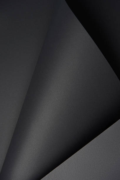 istock close-up view of blank black textured paper background 1002847926
