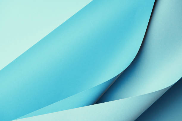 istock close-up view of creative blue abstract paper background 1002848036