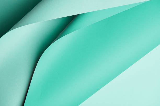 istock close-up view of bright turquoise colored paper textured background 1002848080