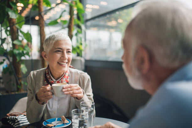 istock Smiling woman with the coffee cup 1002859100