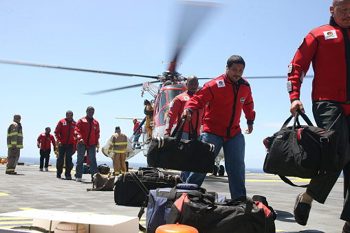 Mossel Bay, Southern Cape, South Africa, December 13,  2007.  Roughneck oil drilling workers arrive on helicopter for duty on the rig, FA Platform,  off the cost of Mossel Bay.