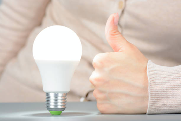 istock Female hand show like and glowing led light 1002864696