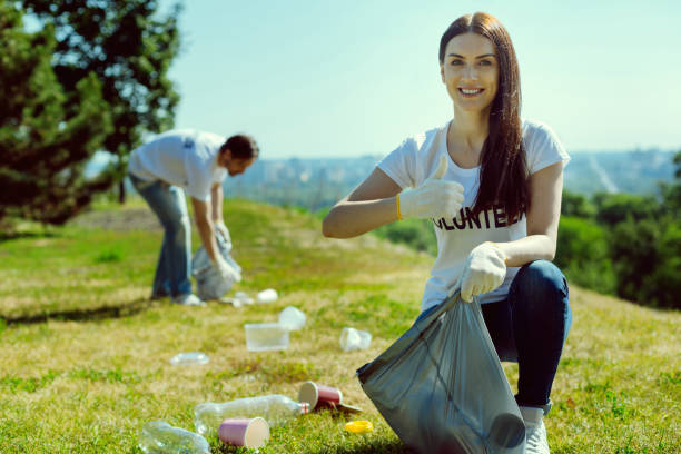 istock Satisfied volunteer raising her thumb up 1002867280