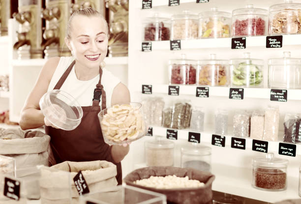 istock Female is selling dried Poma 1002874384