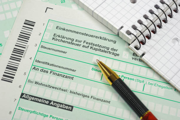 istock Make filling in German tax form for income 1002874880