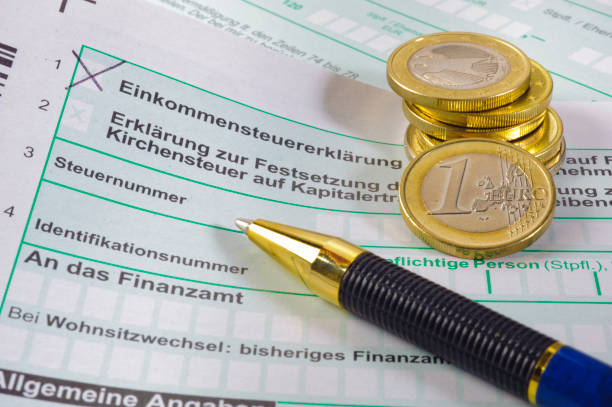 istock Make filling in German tax form for income 1002876652