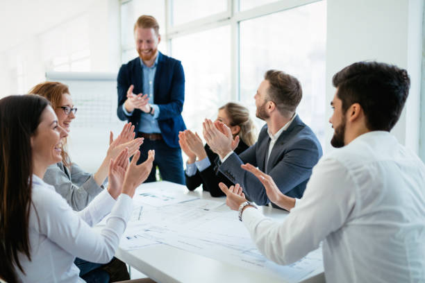 istock Happy business people celebrating success 1002877622