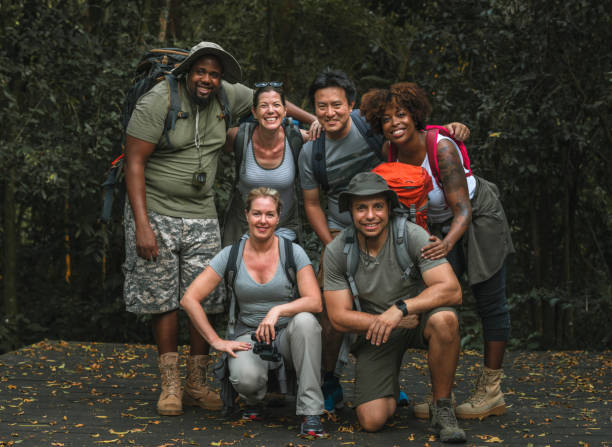 istock Group of happy diverse campers 1002879416