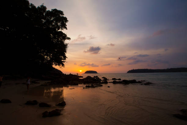 istock Sunset Kata beach, Phuket, Thailand 1002879424