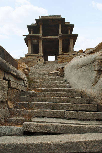istock Two storied gateway behind Narasimha Temple. Hampi, Karnataka, India. 1002880234