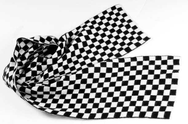 istock Texture, background, pattern. Scarf shawl tippet plaid white and black cell. a woman's long scarf or shawl, worn loosely over the shoulders. 1002883584