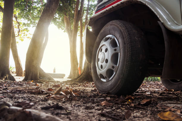 istock Car wheels on a road. Off-road tire. 1002884222