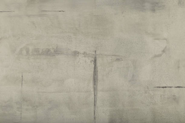 istock Raw or bare concrete wall, shot with panel seam lines perpendicular to image dimension 1002886324
