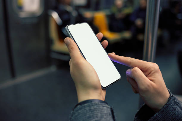 istock Women using smartphone in public transport 1002888726