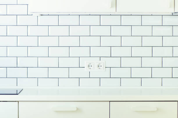 istock Interior of white modern kitchen, nobody inside. Copy space. Banner 1002889578