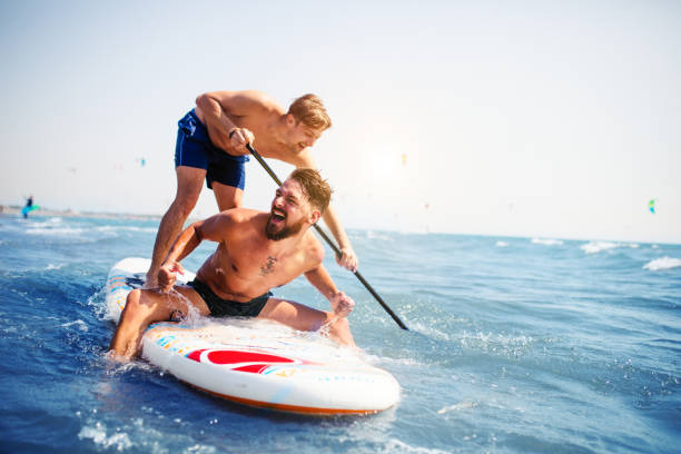 pret van de zomer - tropical surf stockfoto's en -beelden