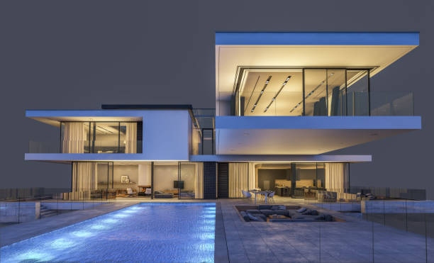 istock 3d rendering of modern cozy house at night isolated on gray. 1002893180