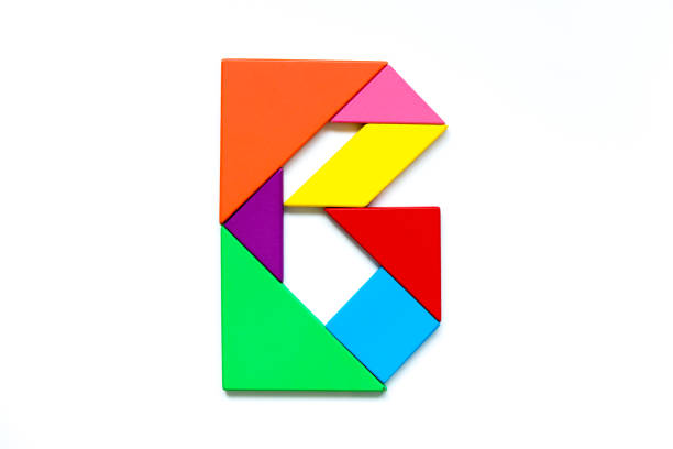 istock Color tangram puzzle in english alphabet b shape on  white background 1002893430