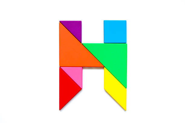istock Color tangram puzzle in english alphabet h shape on white background 1002893458