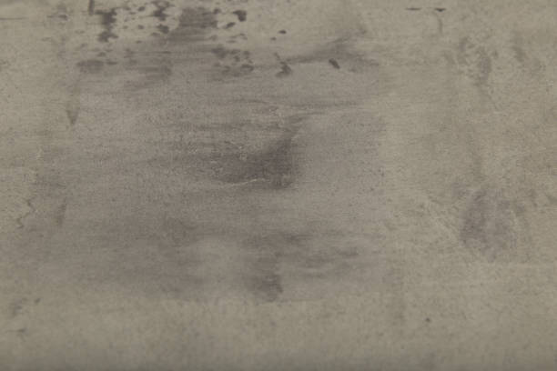 istock Raw or bare concrete wall, shot with panel seam lines perpendicular to image dimension 1002902624