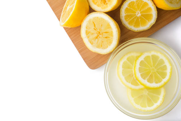 istock Lemons and juice on white background 1002911358