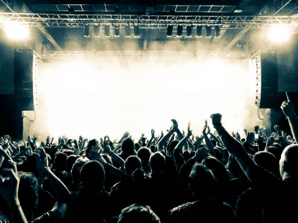 istock Filming concert on smart phone 1002917326