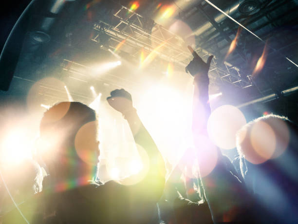 istock Filming concert on smart phone 1002917328
